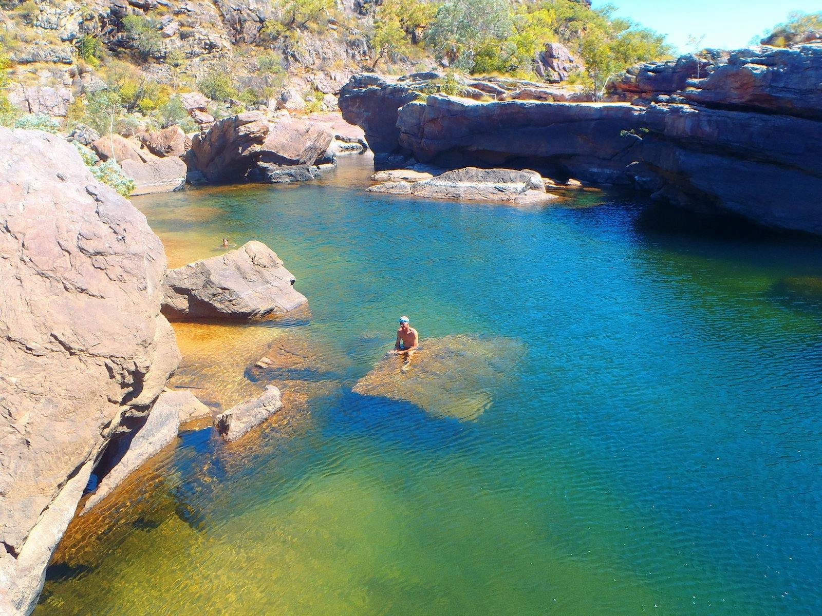 Territory Expeditions guests at Jarrangbarnmi (rock pools, waterfalls, rock landscape)