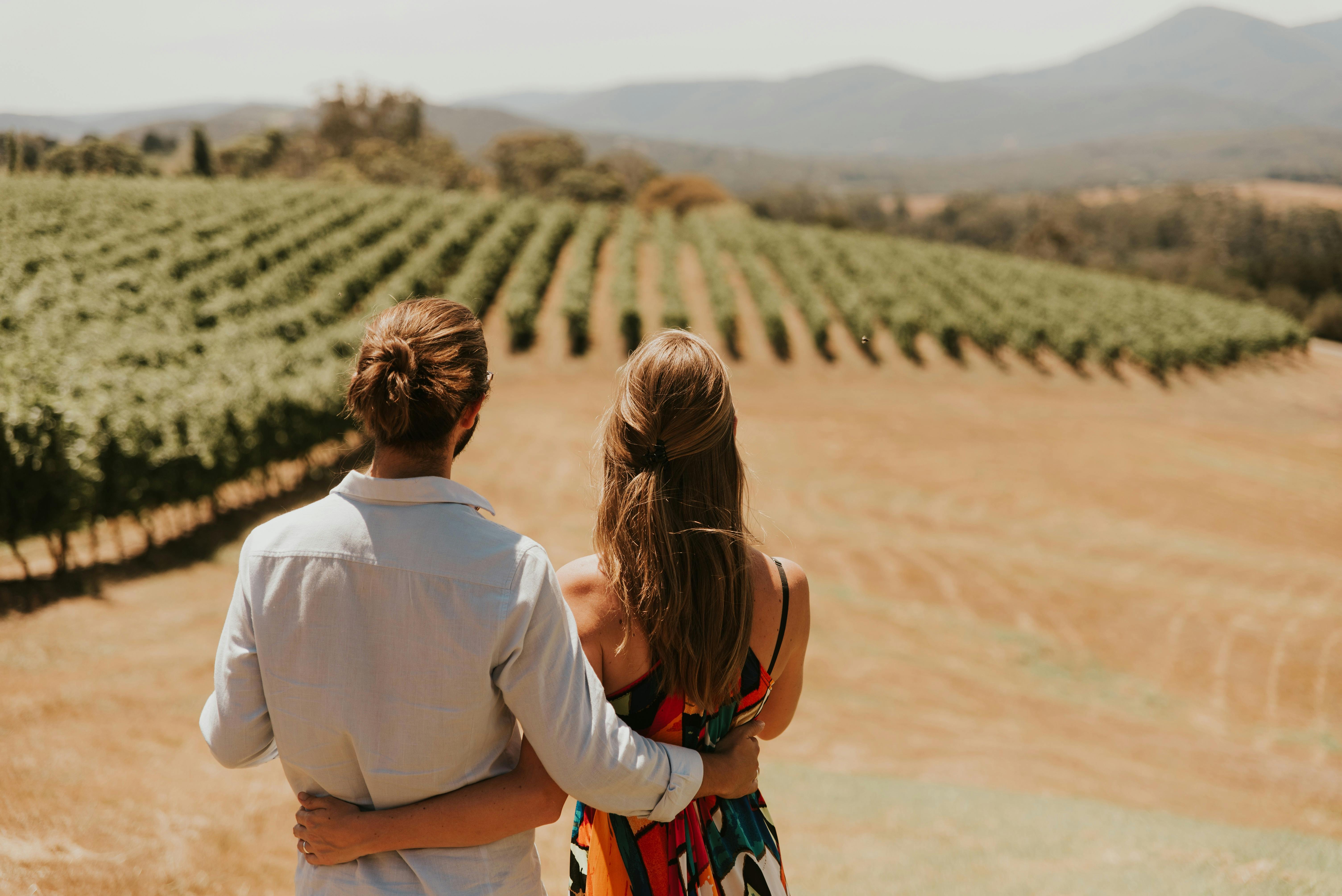 Yarra Valley Touring couple in the vines