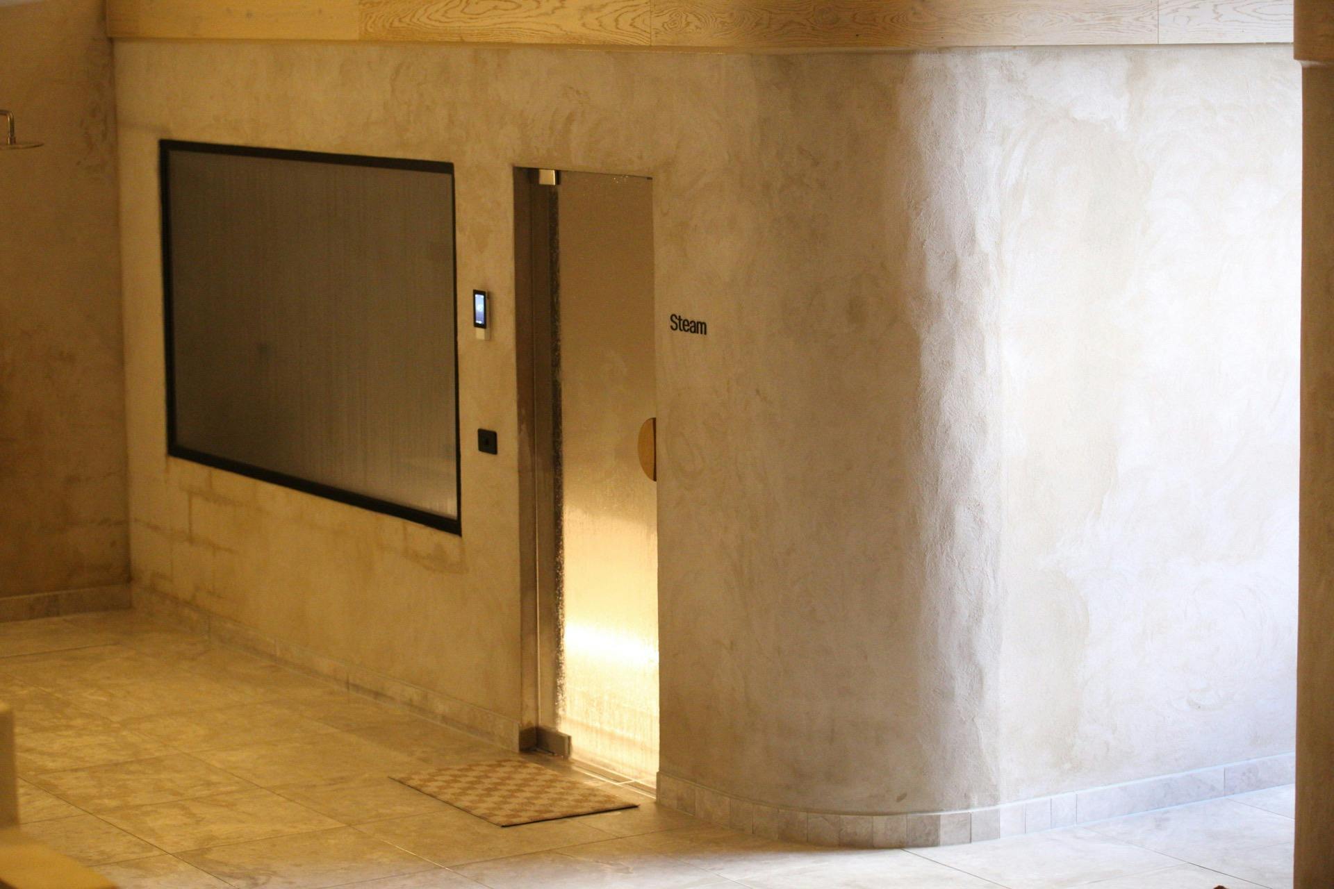 Steam Room with door entry and large window