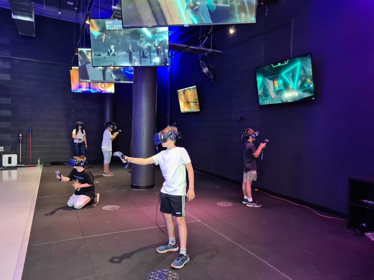 Kids playing VR laser tag