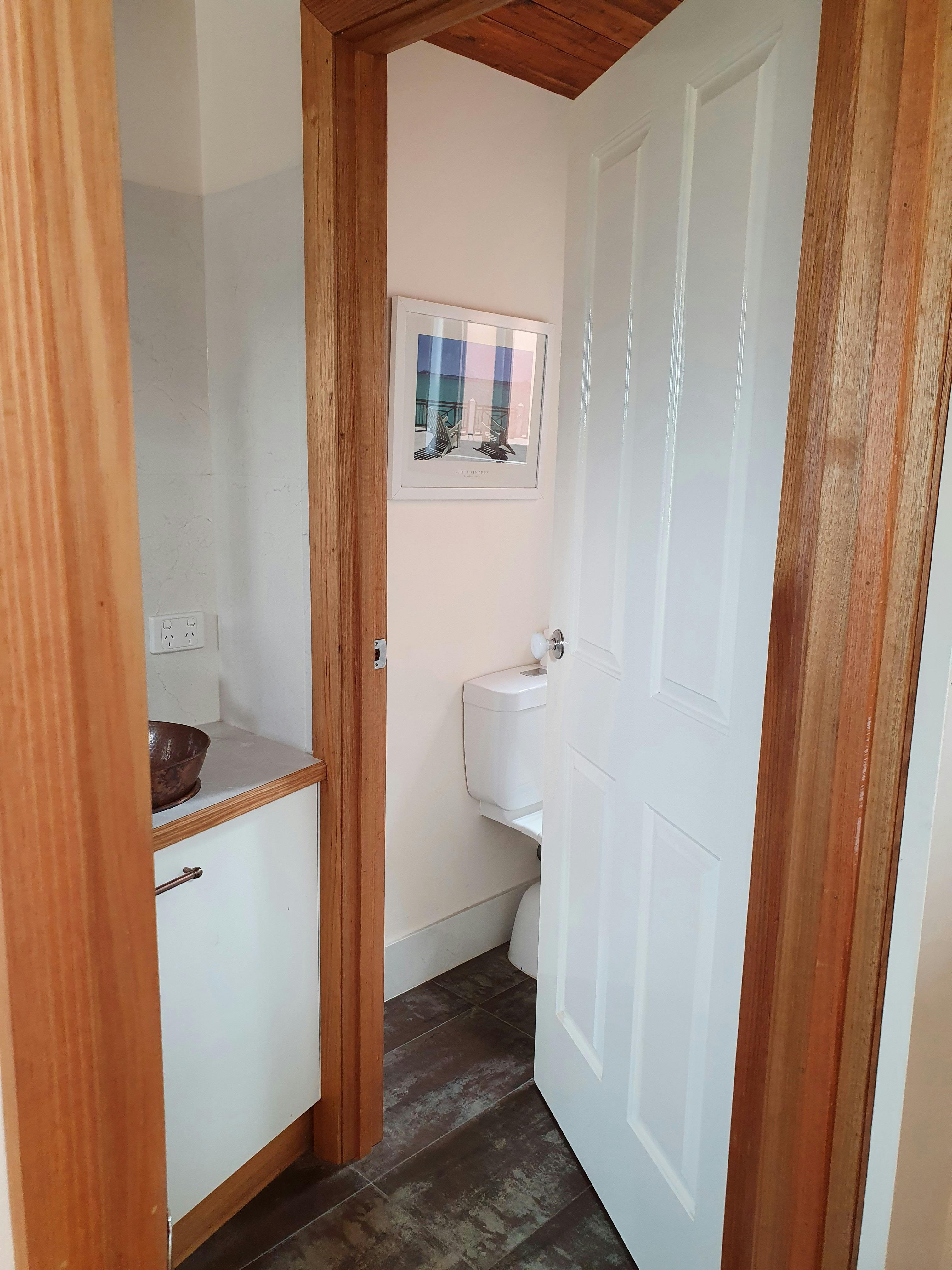 Toilet is totally separate to bathroom area for privacy.