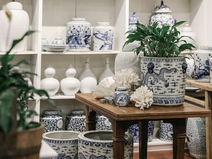 Chinese blue & white porcelain, sustainably sourced coral, vintage furniture.