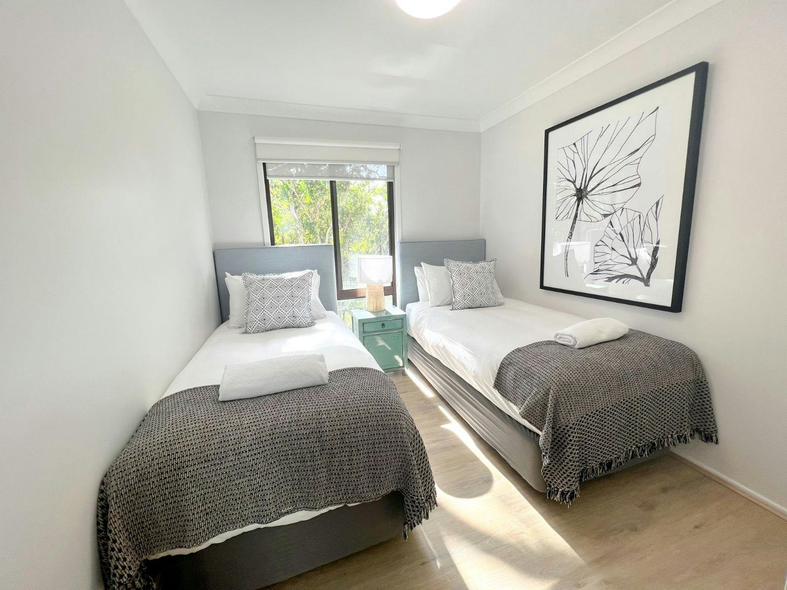 Bedroom 3 has 2 single beds