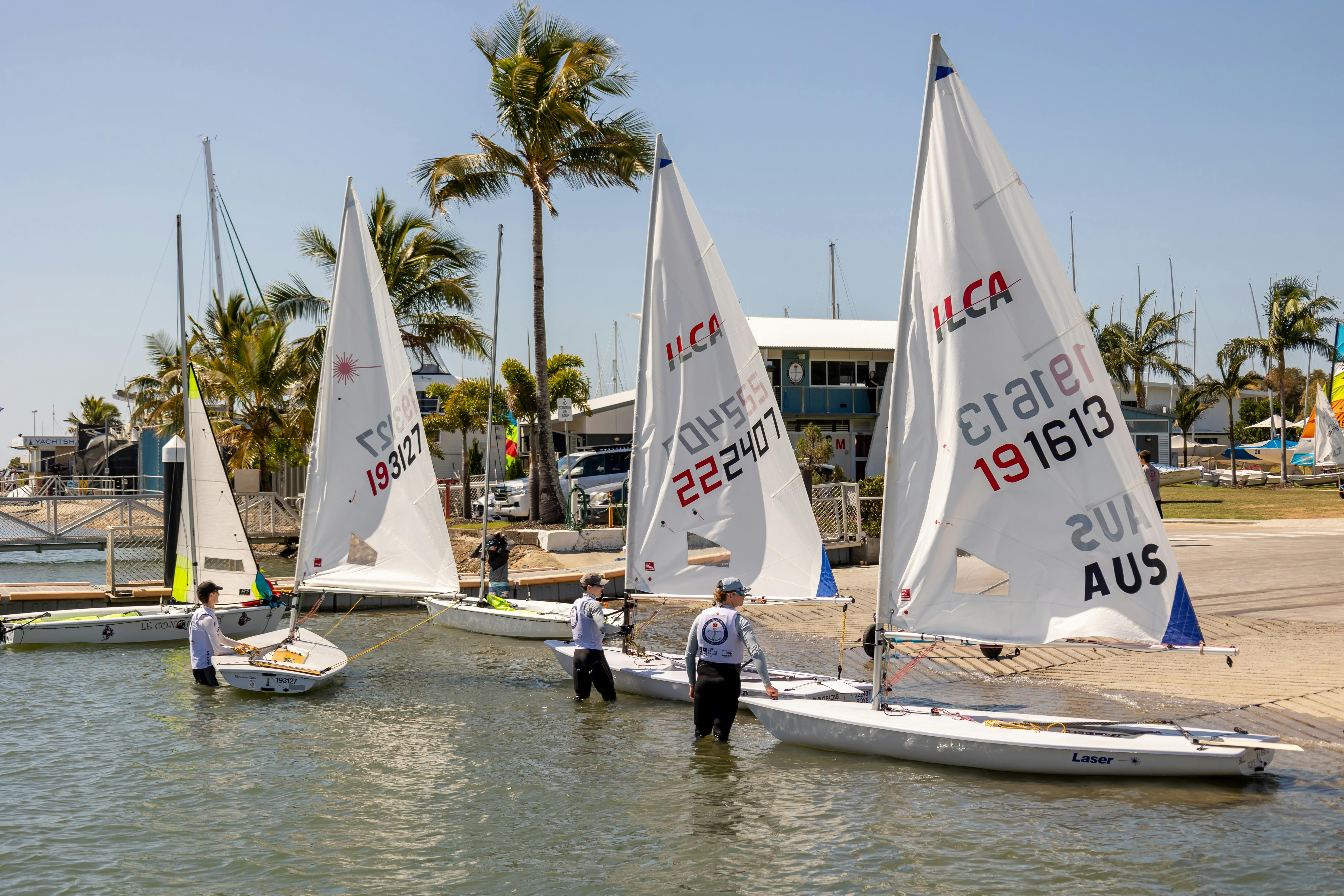 smaller boats leaving the beach