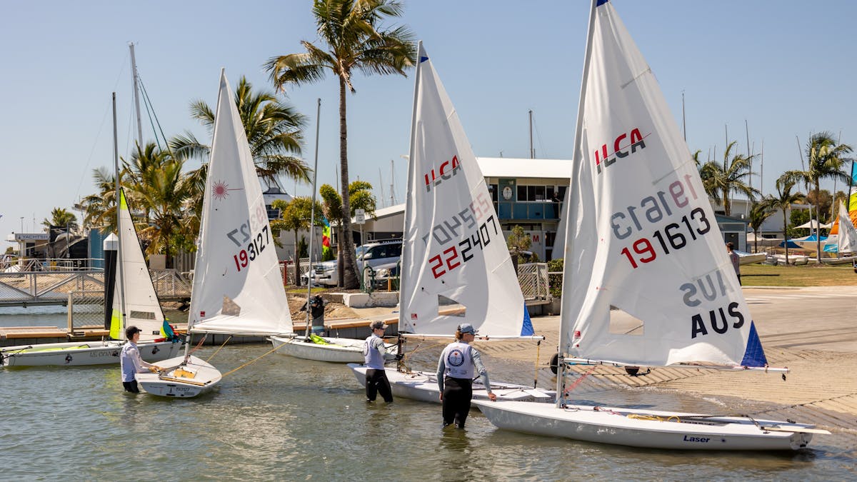 smaller boats leaving the beach