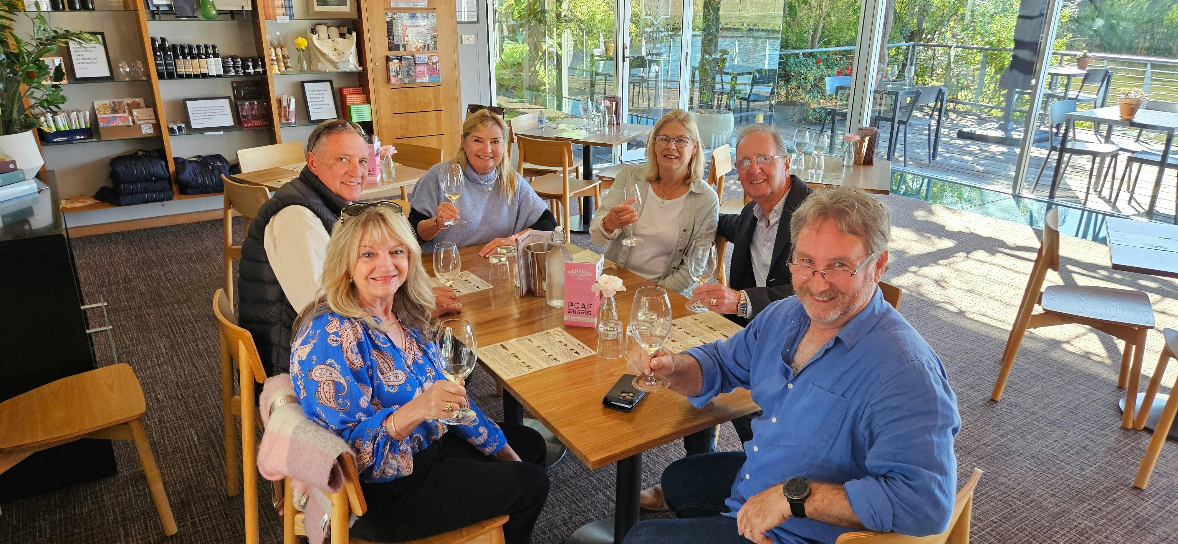 Coonawarra Experiences group raising glasses during winery tasting.