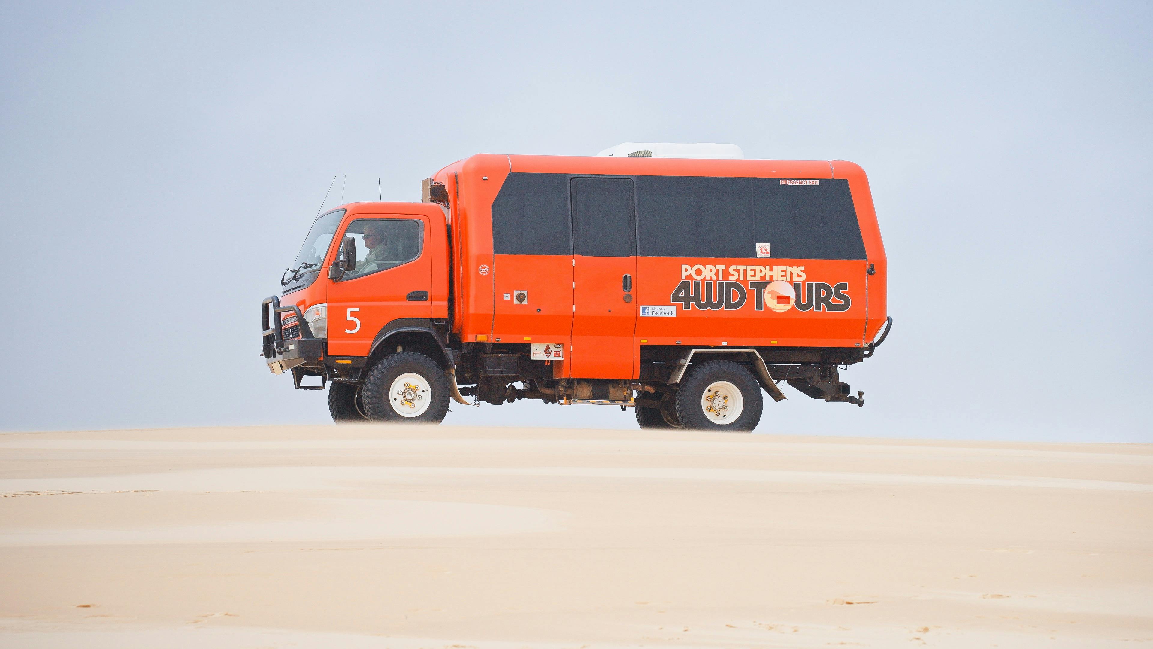 Red Bus on Sand Dunes