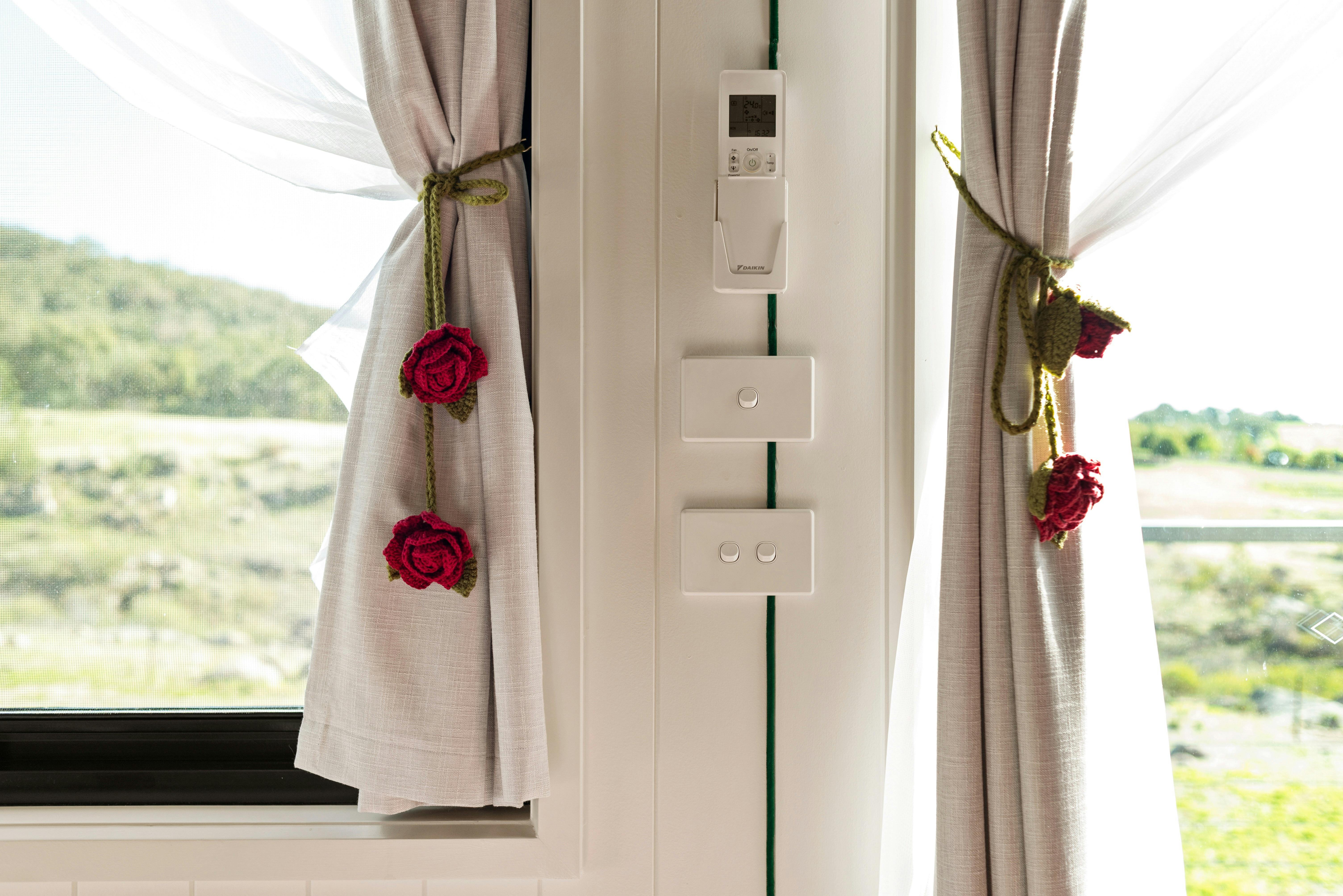 Windows and curtains with view in the background