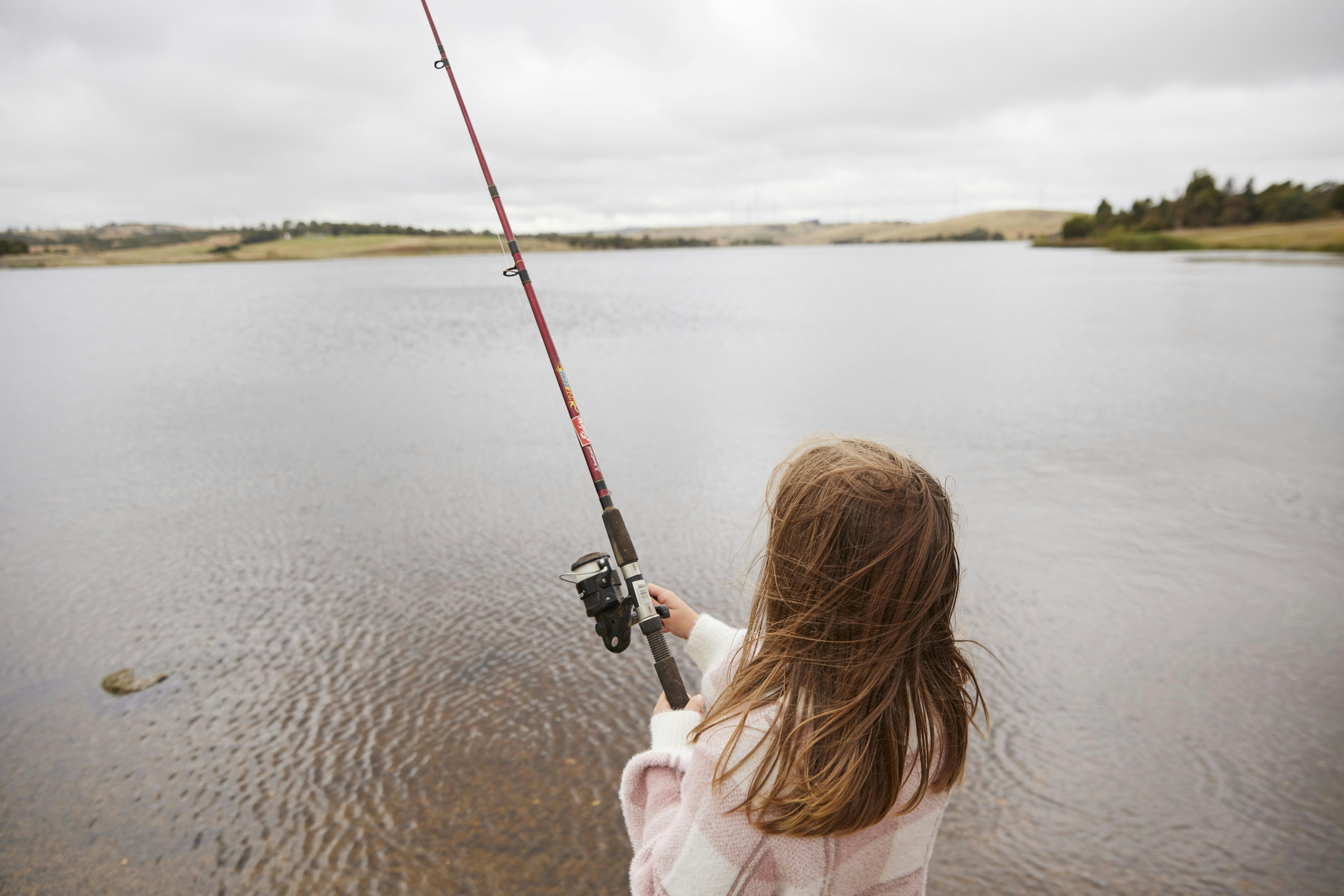Young girl fishing at Pejar Dam