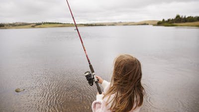 Young girl fishing at Pejar Dam