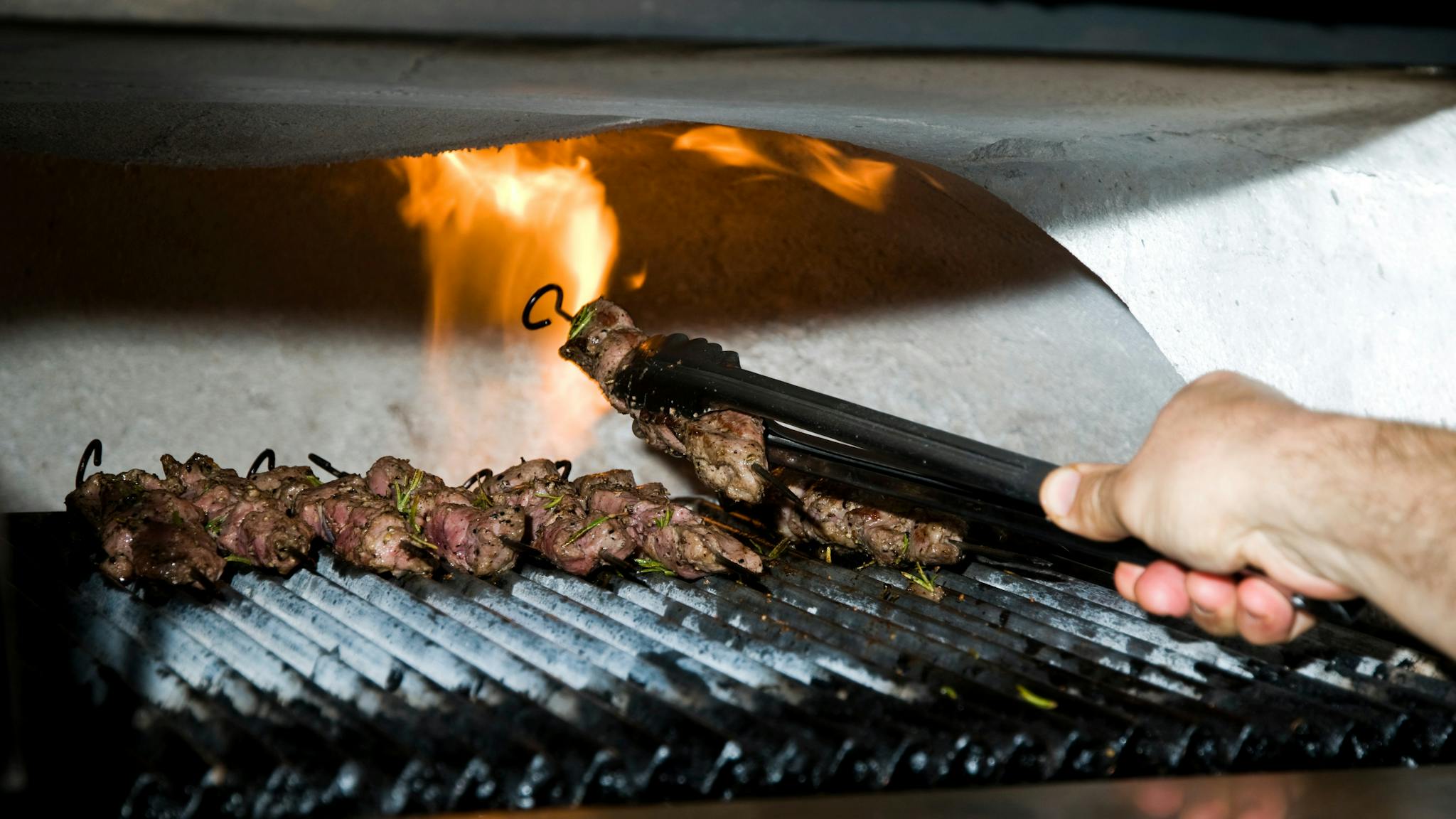 Grilling Rosemary and Garlic Lamb Skewers in the Taboon Oven Grilling Rosemary and Garlic Lamb Skewers in the Taboon Oven