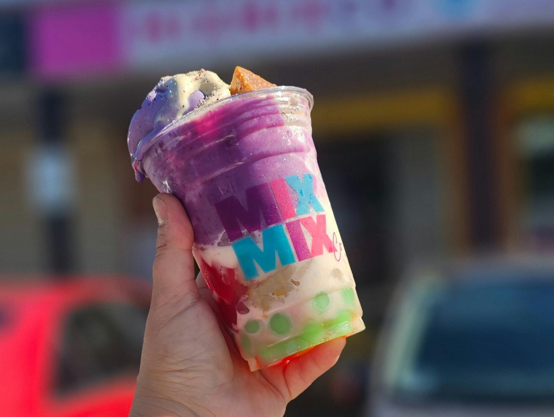 Mix Mix Co. - someone holding a Mix Mix Co. drink