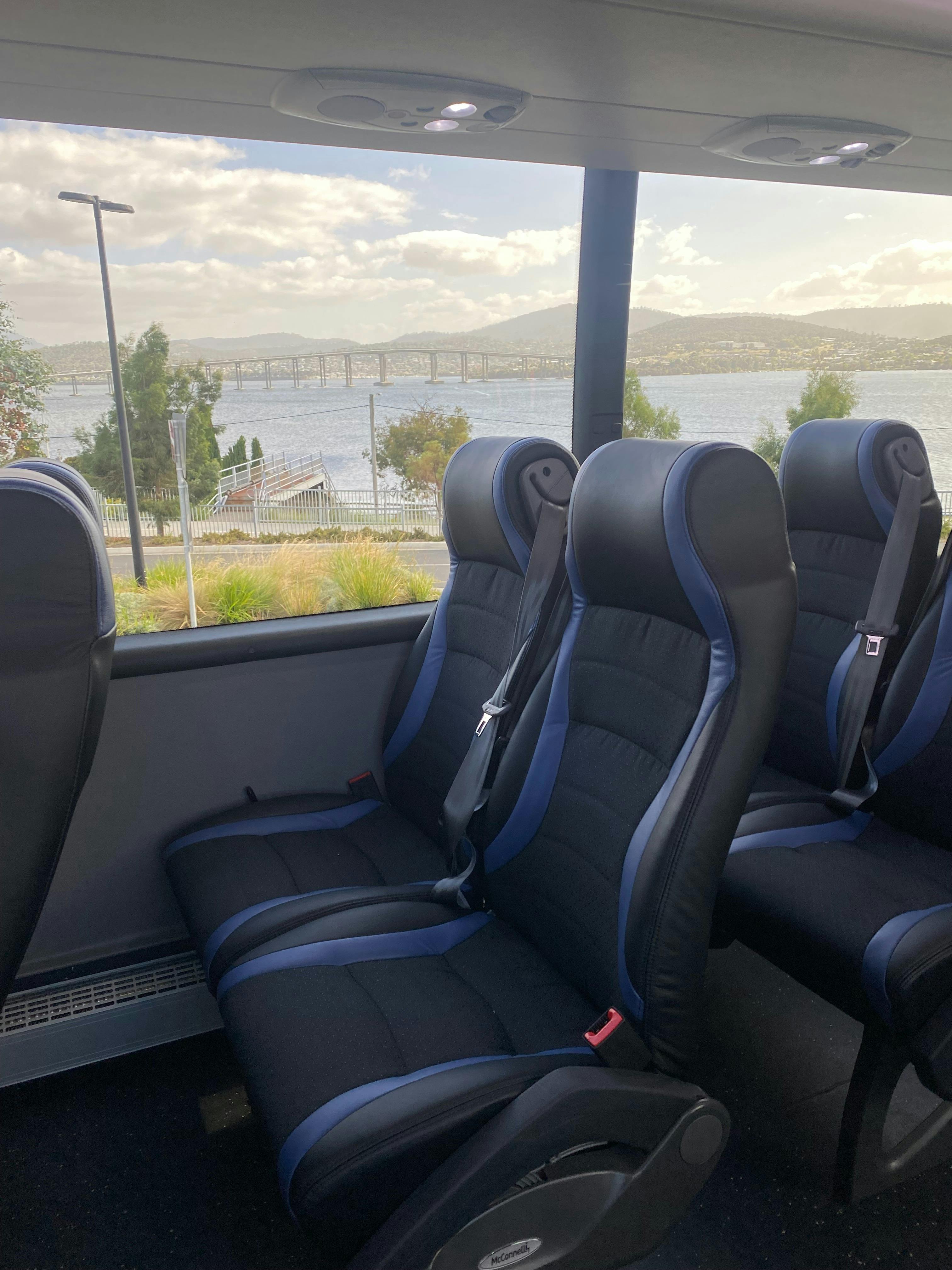 Panoramic windows, Reclining seats, foot rests, Ample Leg room