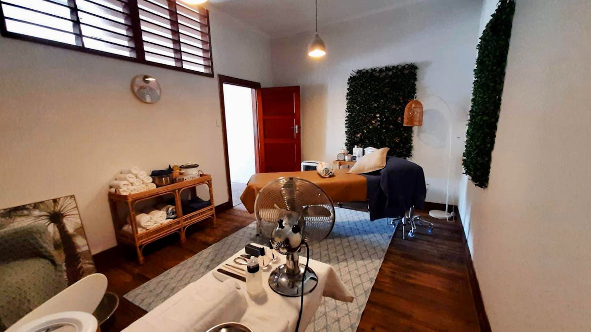 Beauty treatment room at The Retreat Cunnamulla, with nail table, pedi area and massage bed
