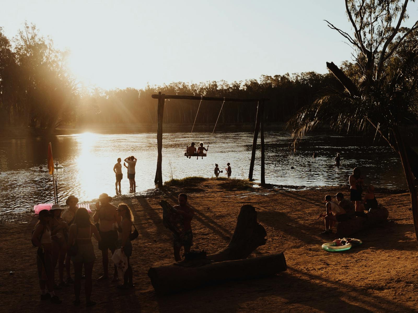 People enjoying golden hour at strawberry Fields on the River Murray