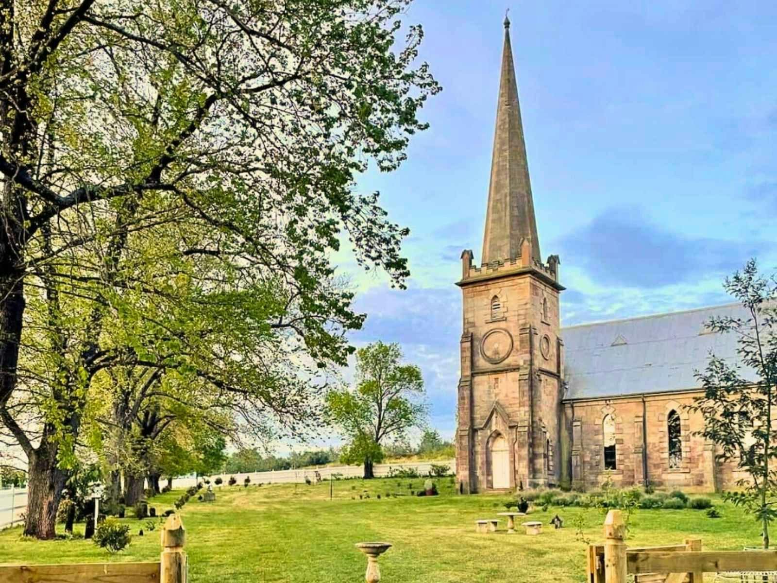 1857 Sandstone Church Campbell Town Tasmania with parklike grounds