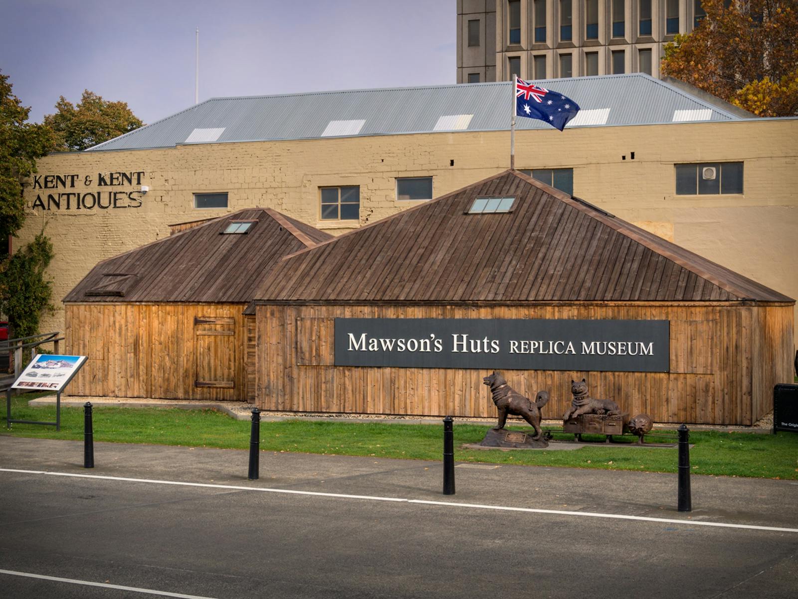 Recent image of the Mawson's Huts Replica Museum with sled dogs statue