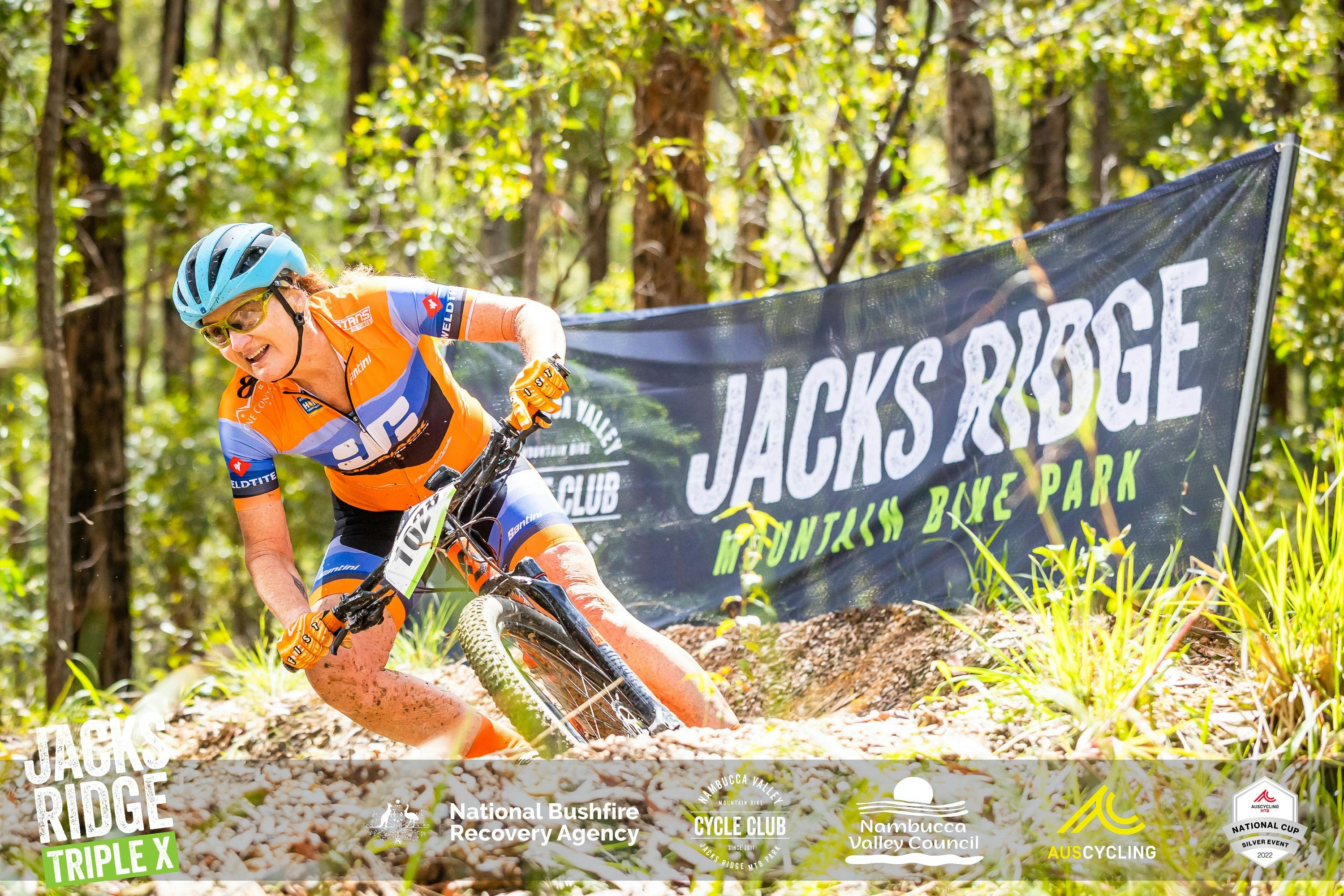 Michelle Newstead in action on the track, leaning around a corner showing why she's a Masters Winner