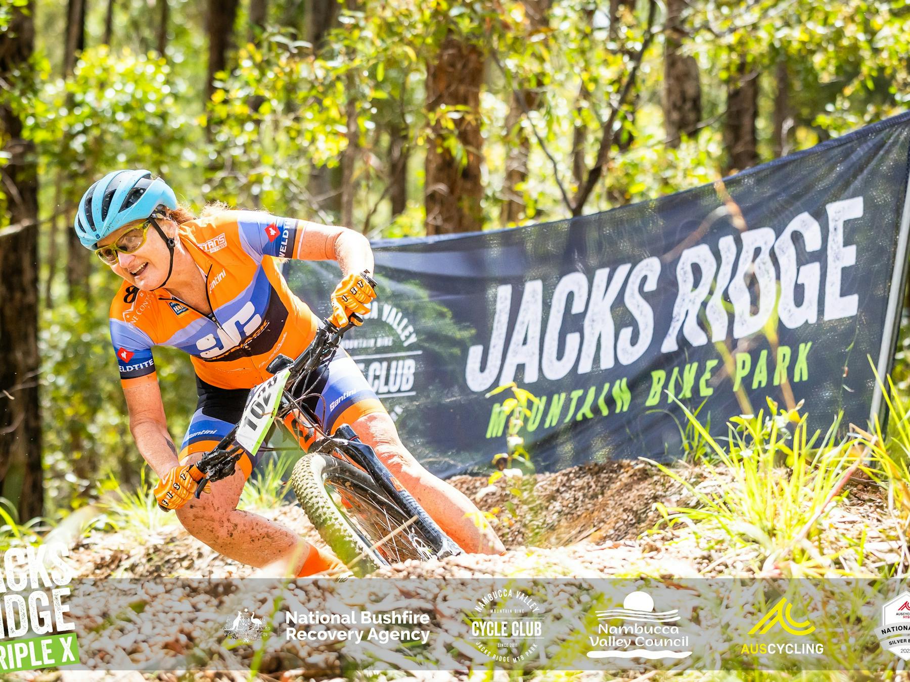 Michelle Newstead in action on the track, leaning around a corner showing why she's a Masters Winner