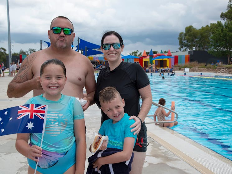 Family of four at the Pool