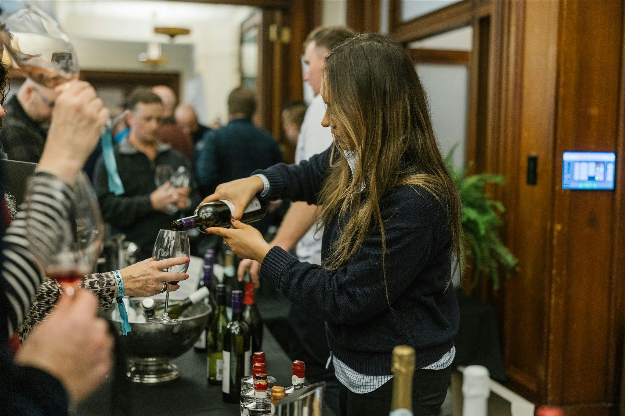 lady pouring wine