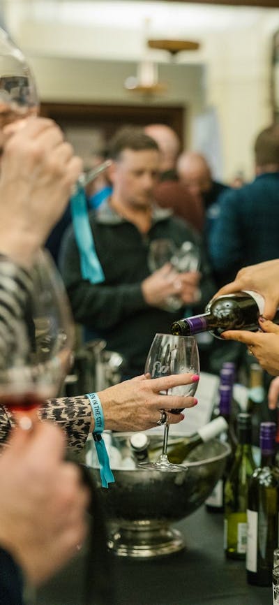 lady pouring wine