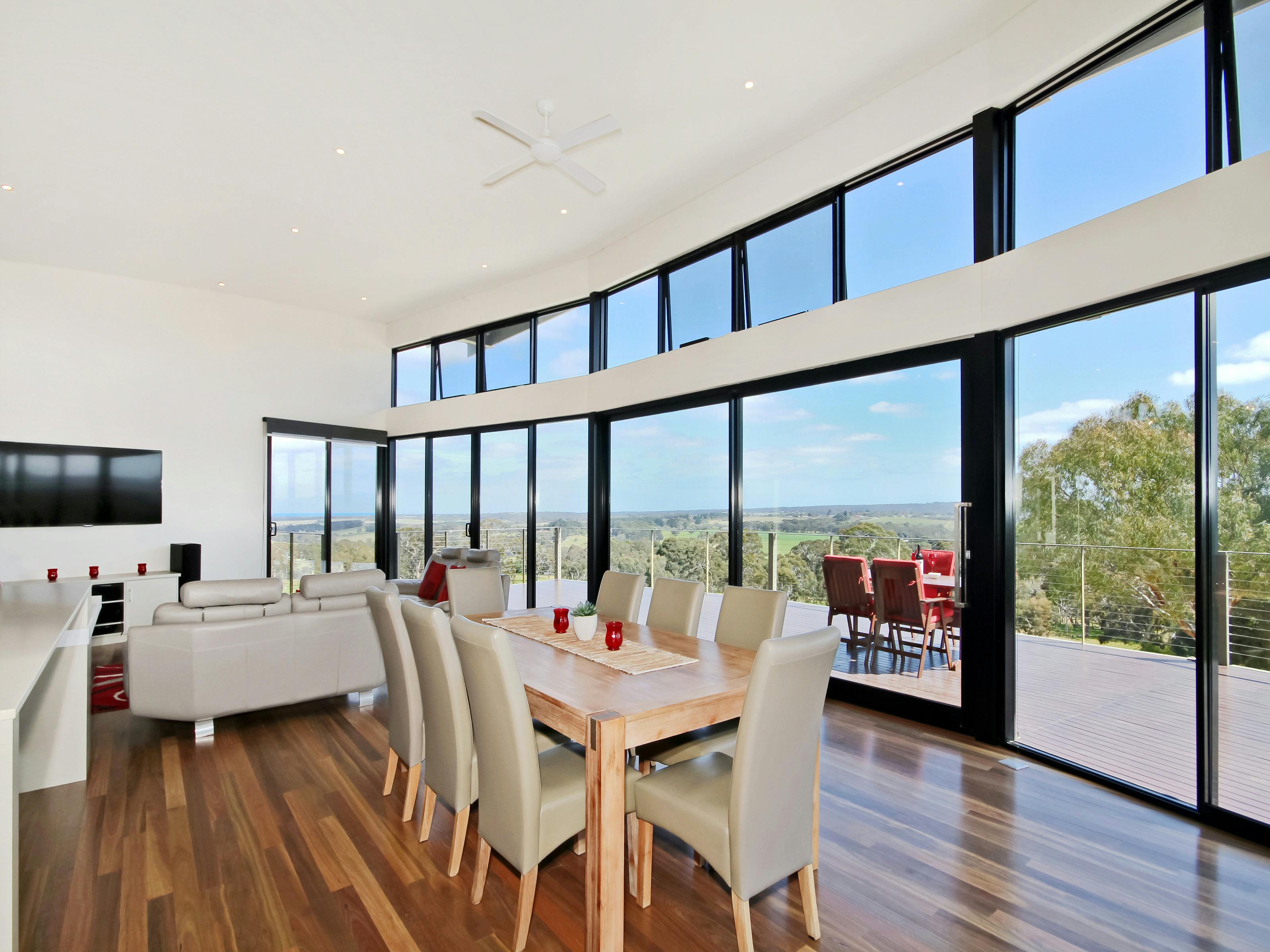 Dining and living area onto the deck and a spectacular view of the region.