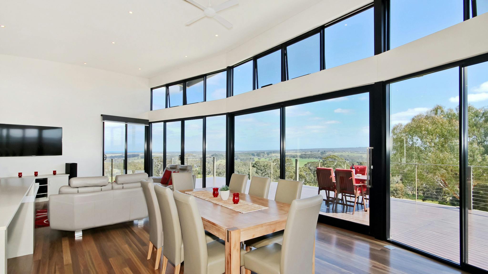 Dining and living area onto the deck and a spectacular view of the region.