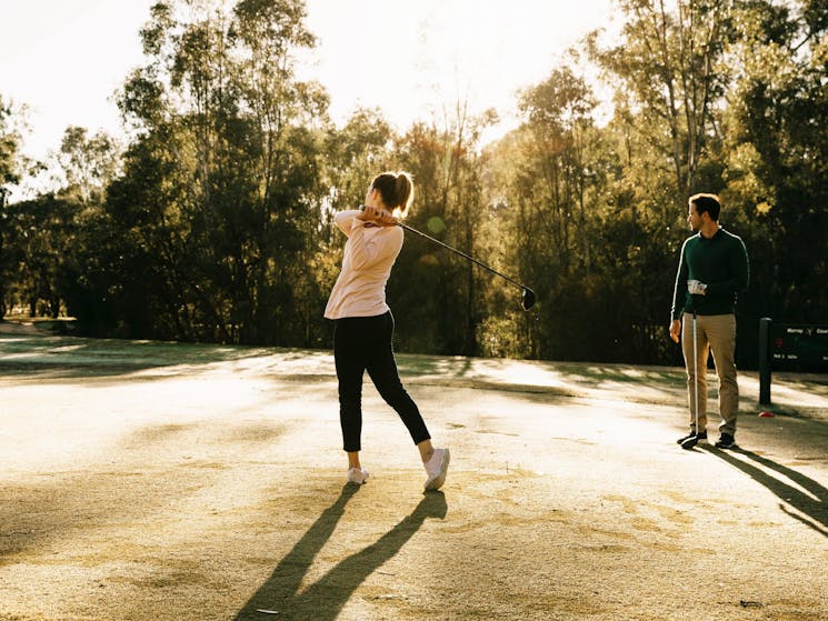 Woman enjoying a day of golfing at Yarrawonga Mulwala Golf Club Resort