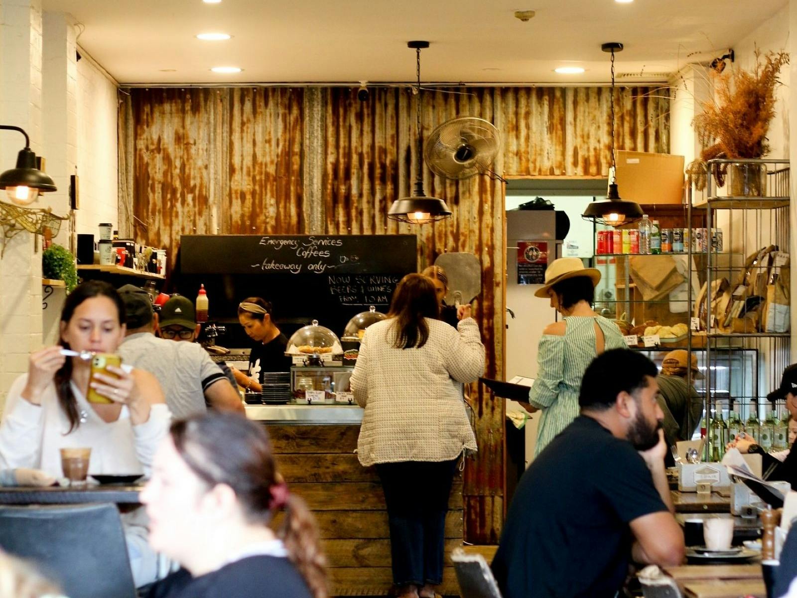 Inside Cafe Boker cafe full of customers