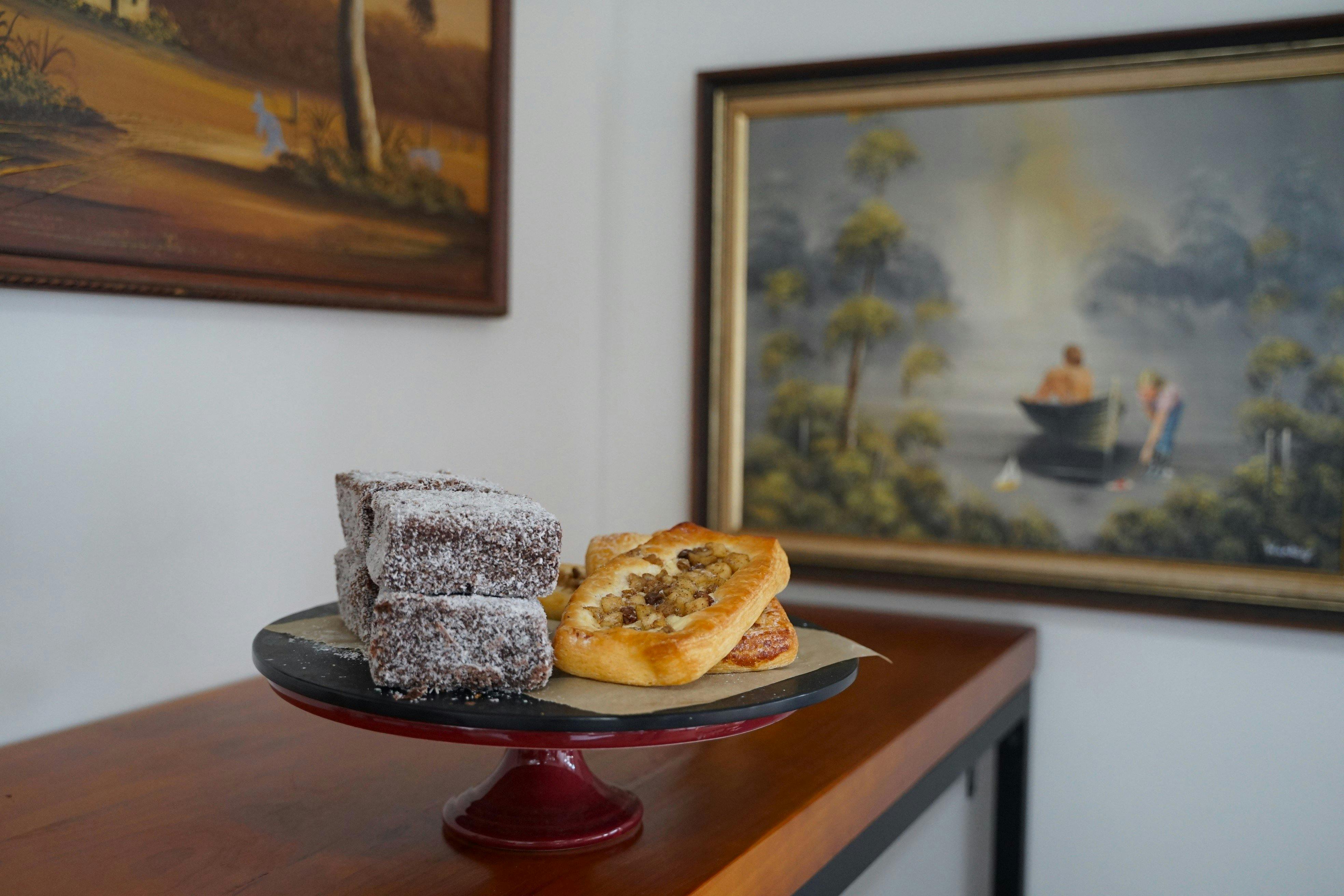 Lamingtons and pastries on a plate