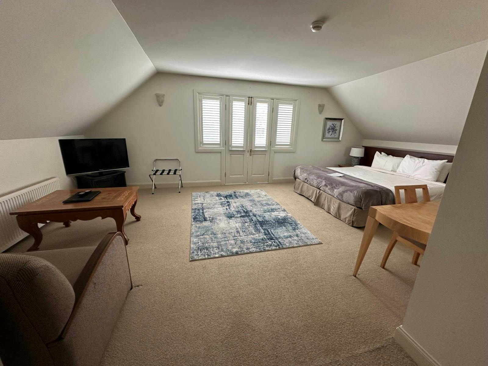 Suite 10, King bed, single sofa bed, ensuite and juliette balcony