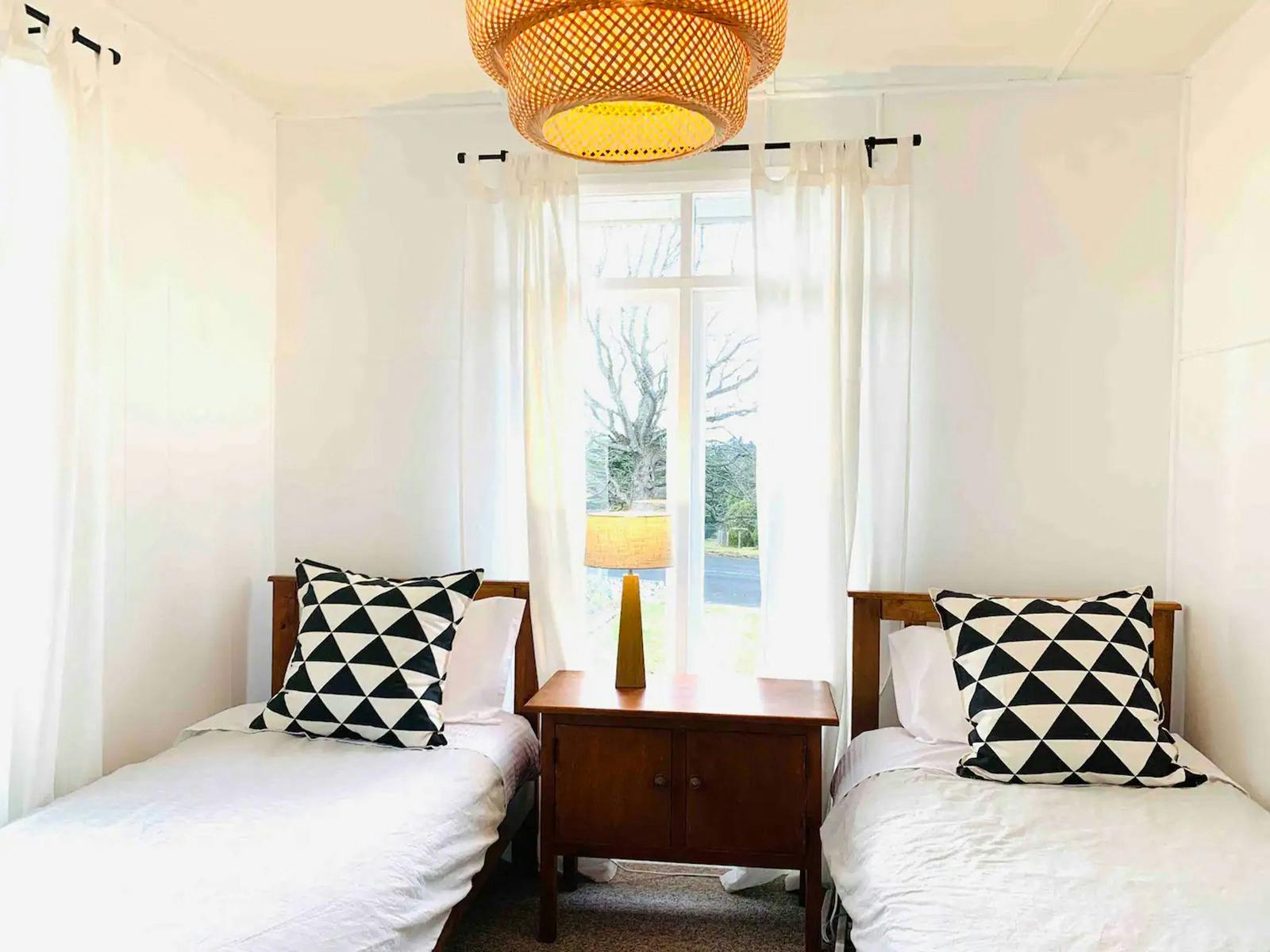 Two single beds and a dresser