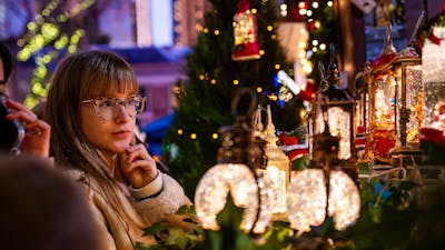 Woman browsing Christmas snow balls