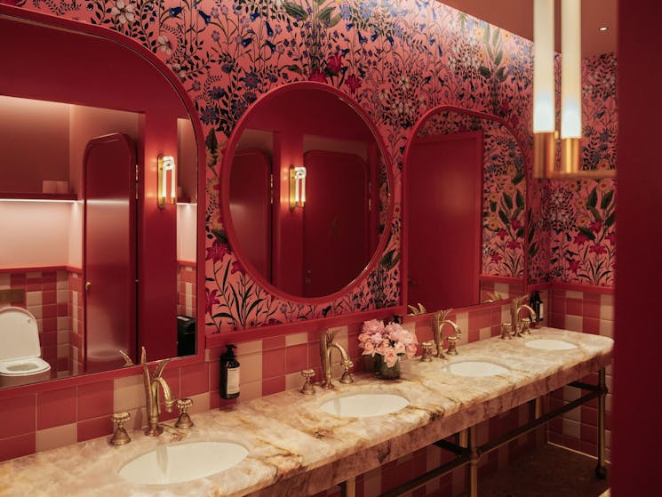 Ladies' bathroom with Gucci wallpaper at Hatch Restaurant