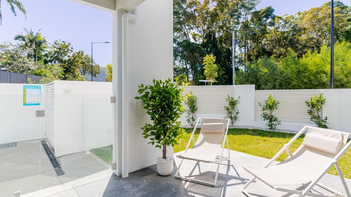 Balcony with outdoor dining, BBQ and sun-loungers