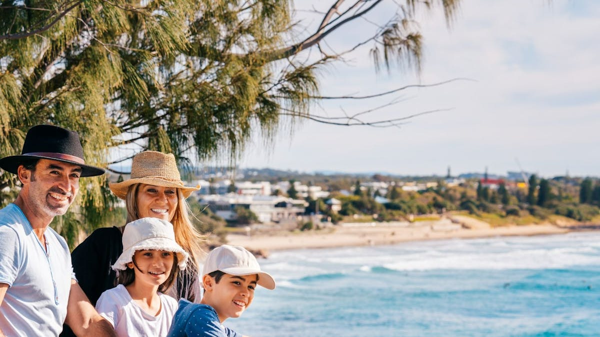 Family on Coolum Beach headland