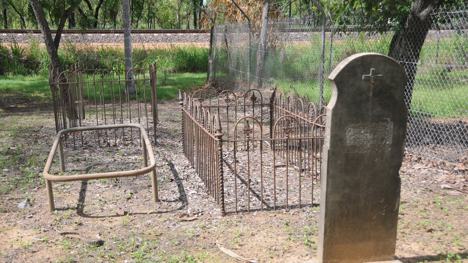 Rudimentary graves at Adelaide River Pioneer Cemetery.