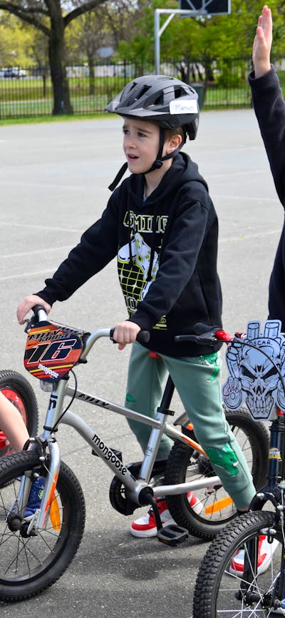Four young boys with their bikes