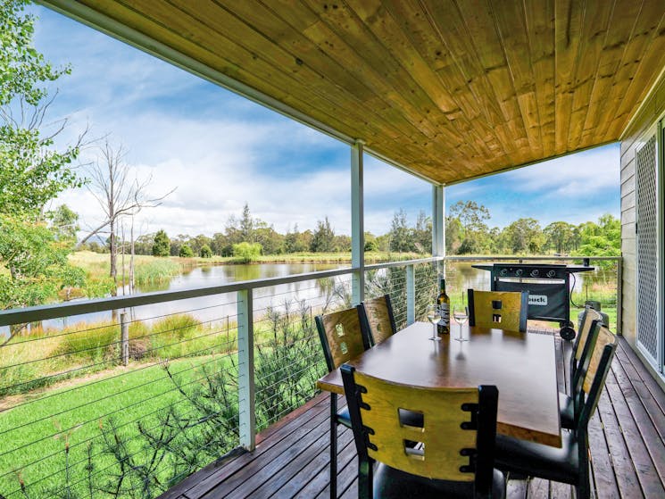 Looking towards the duck pond from the veranda of a Waterview Cottage