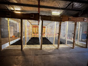 Five axe throwing cages
