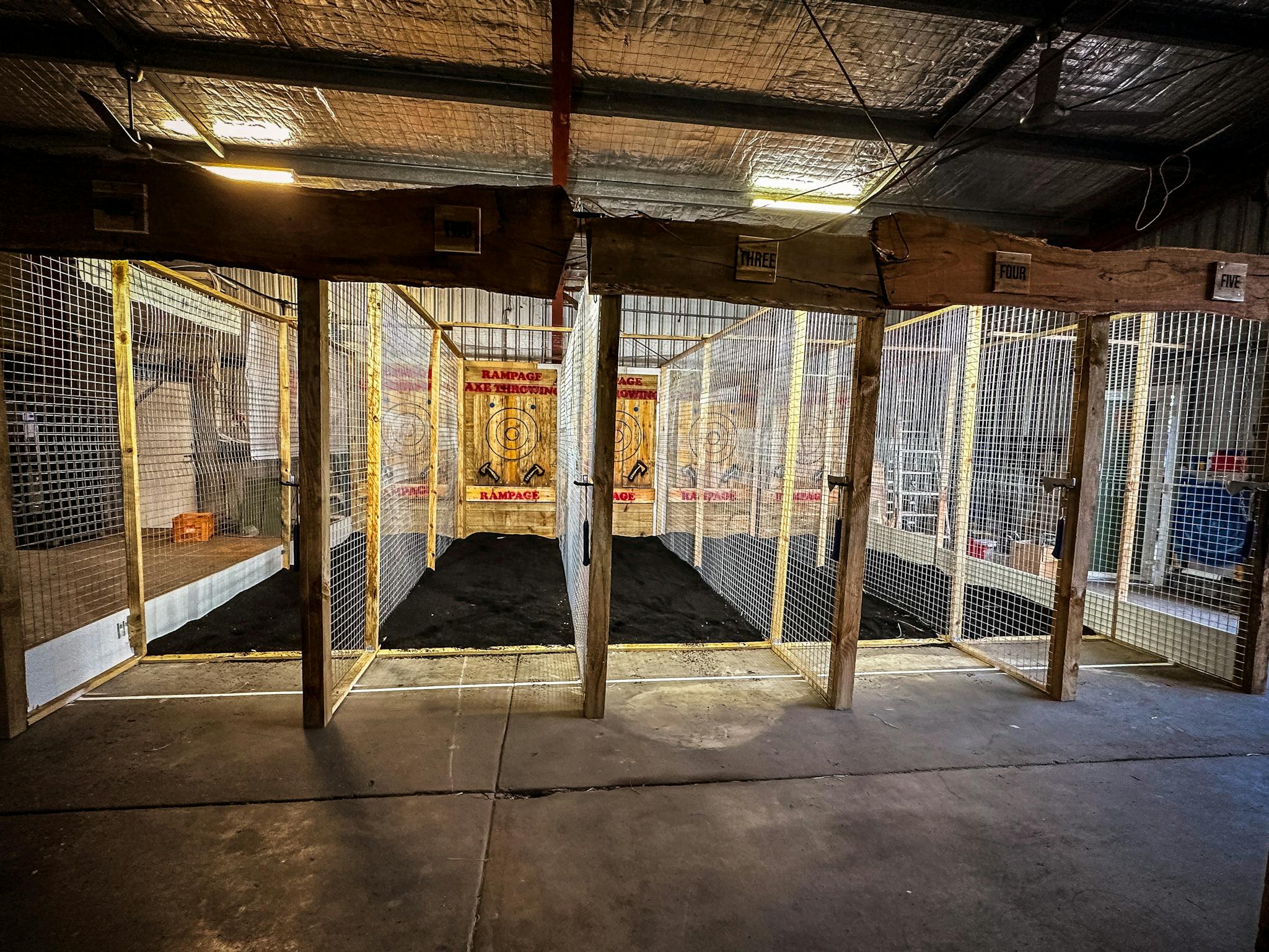Five axe throwing cages Five axe throwing cages