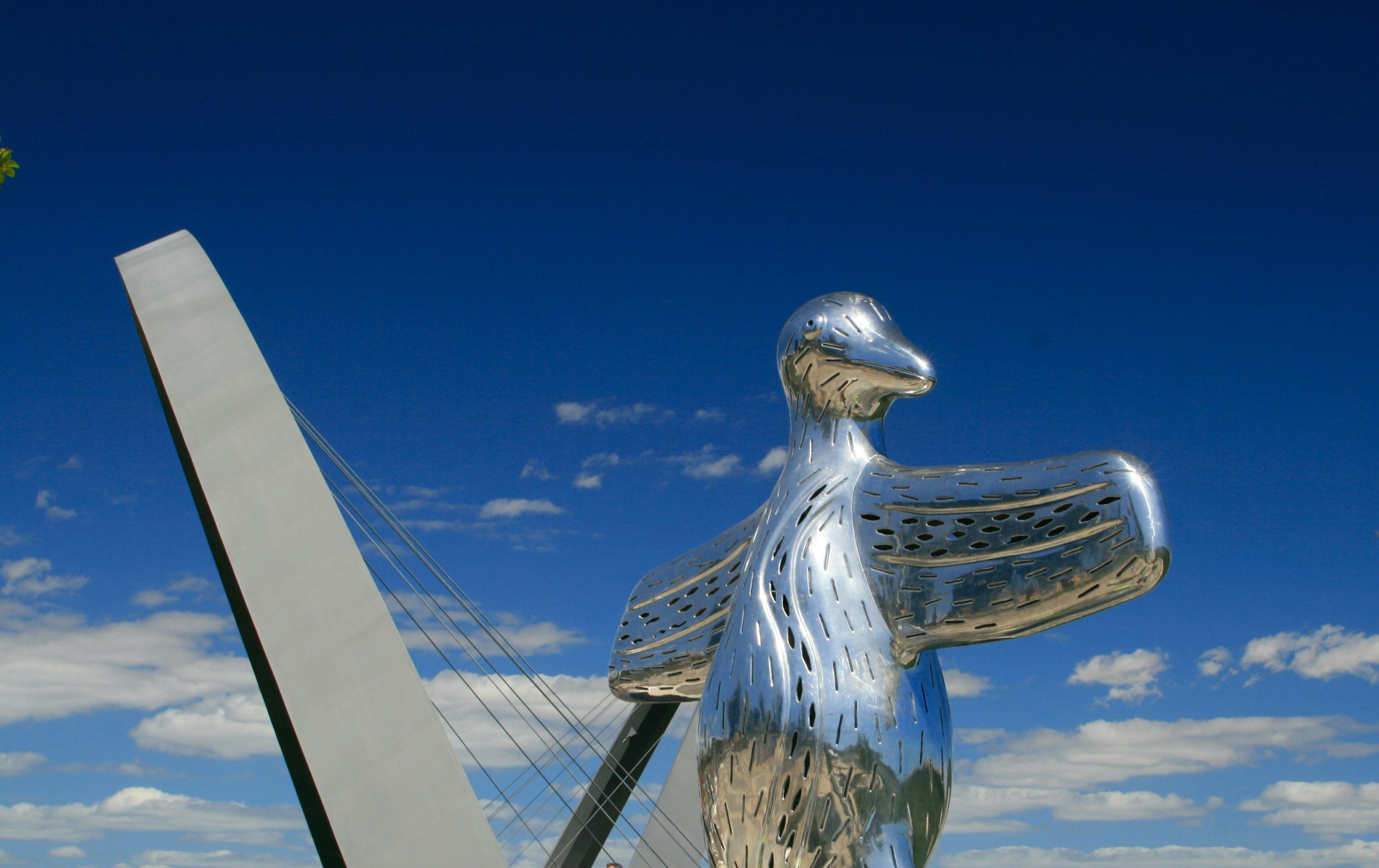 Shiny chrome bird Sculpture