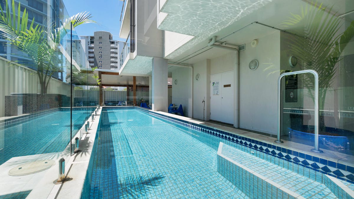 This outdoor lap pool is perfect to unwind and relax in