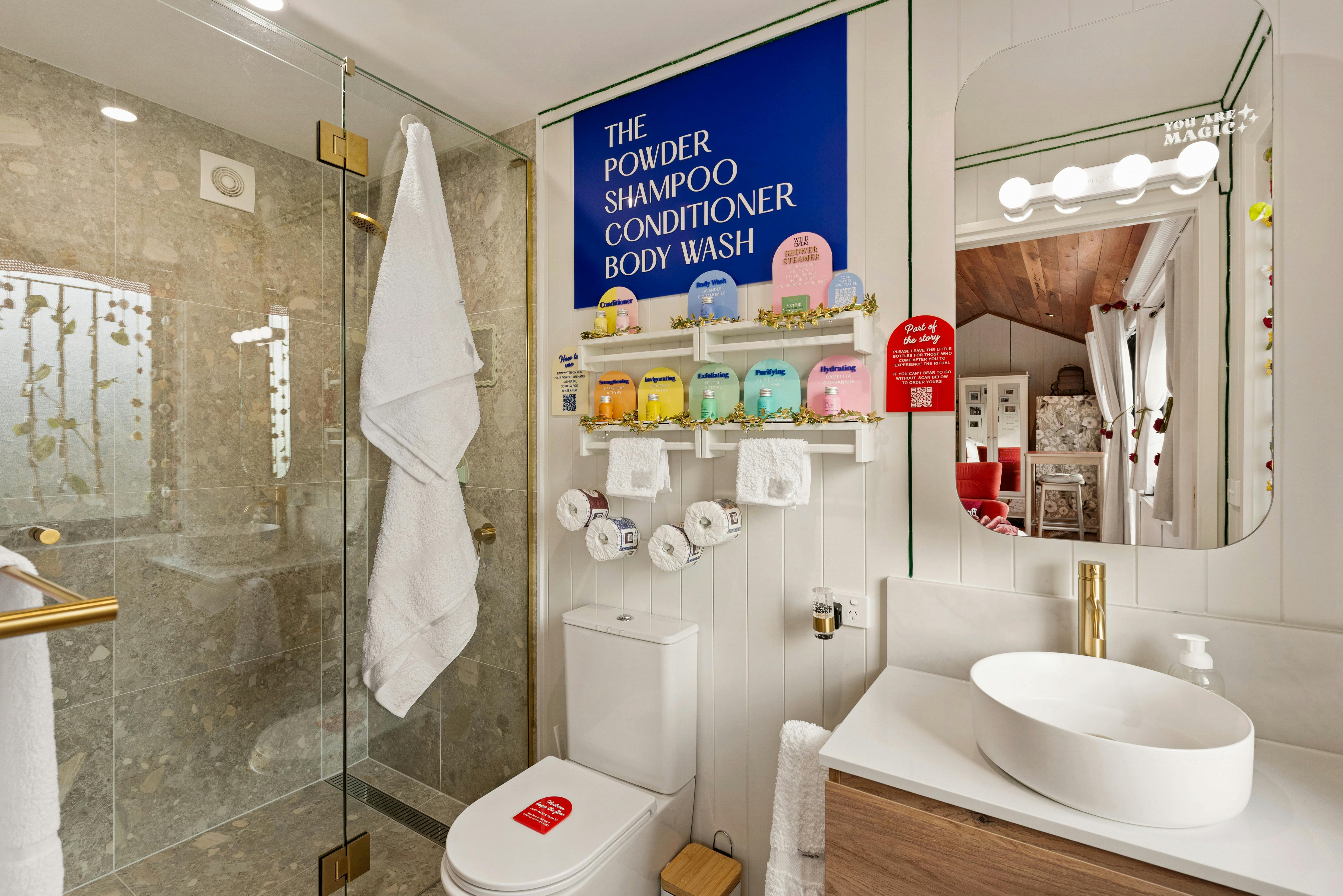 Bathroom interior showing shower, toilet and basin