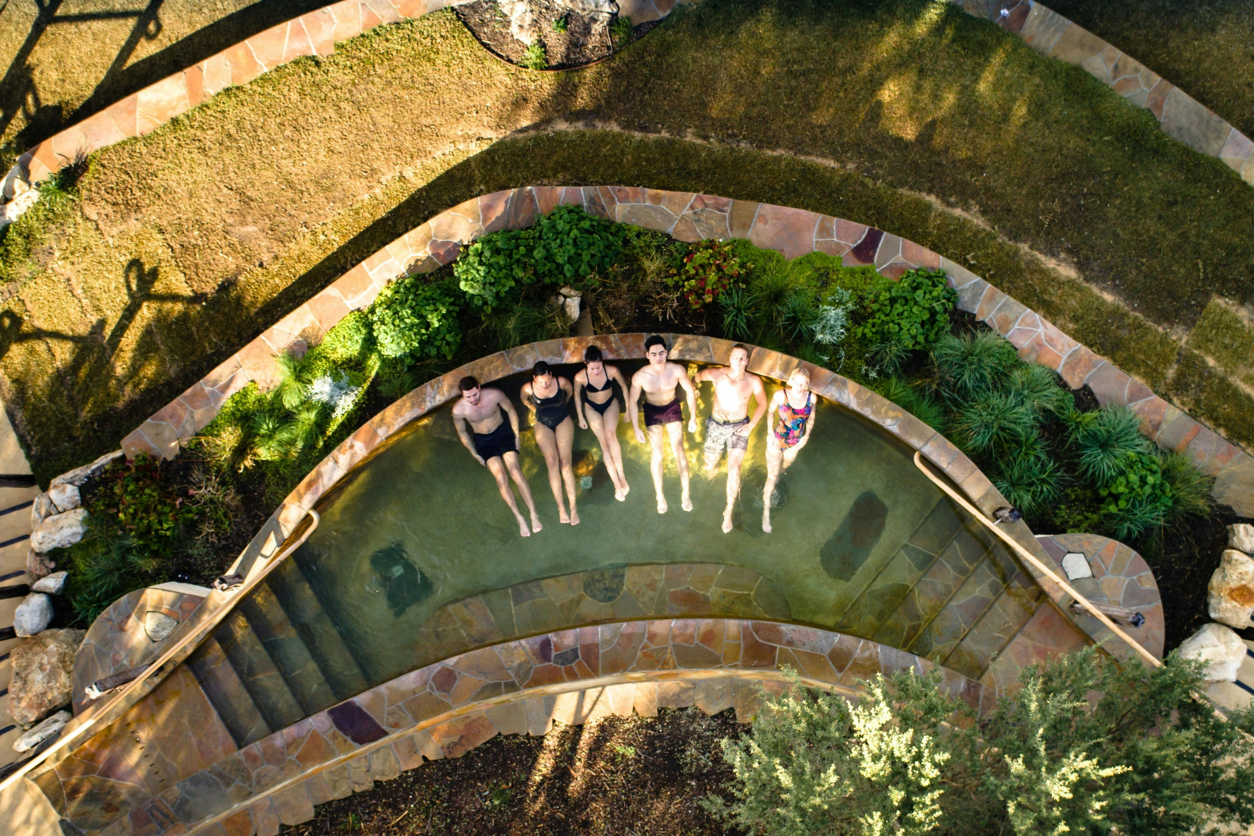 Bath House Amphitheatre - Guests bathing in pool