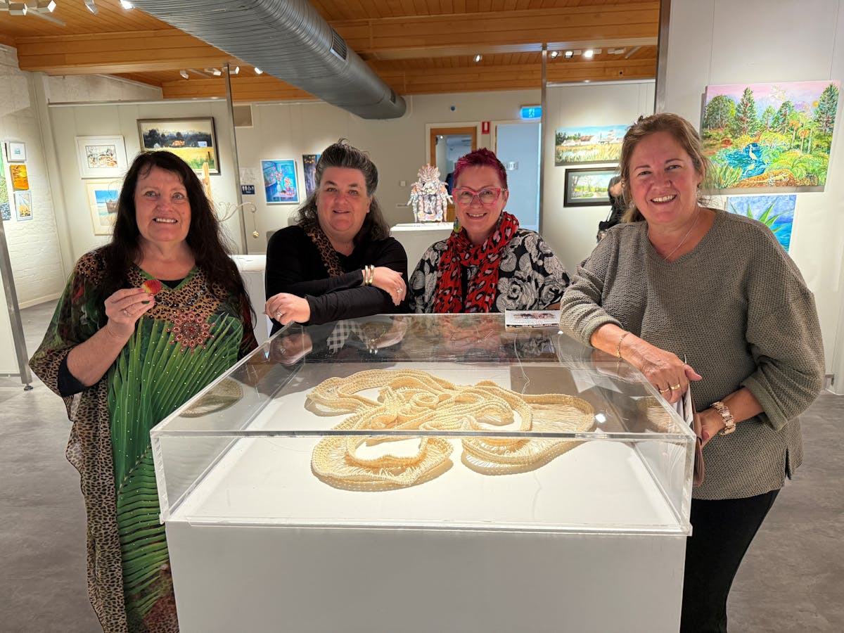 Local Artists enjoying an exhibition opening.