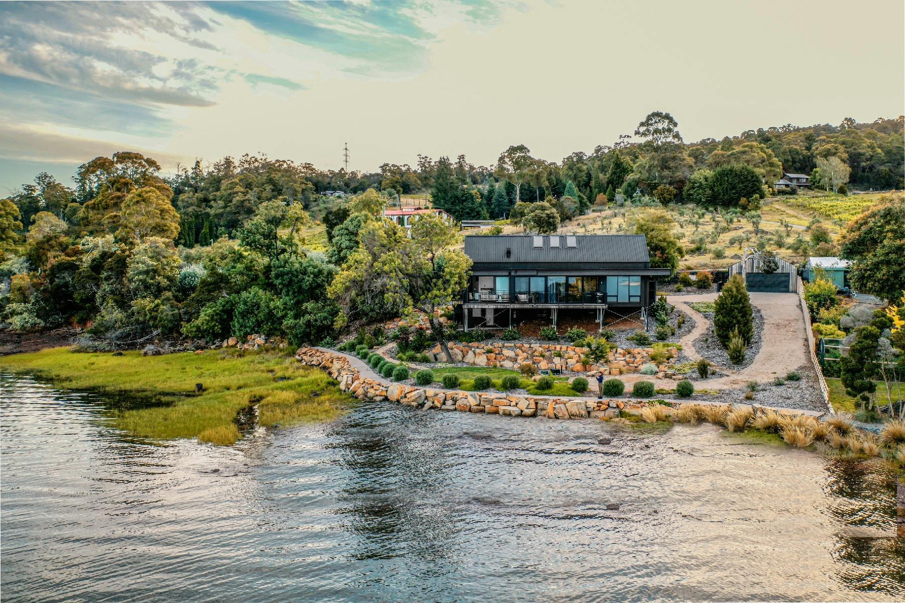 This is a stunning shot of the full view of the property from the river