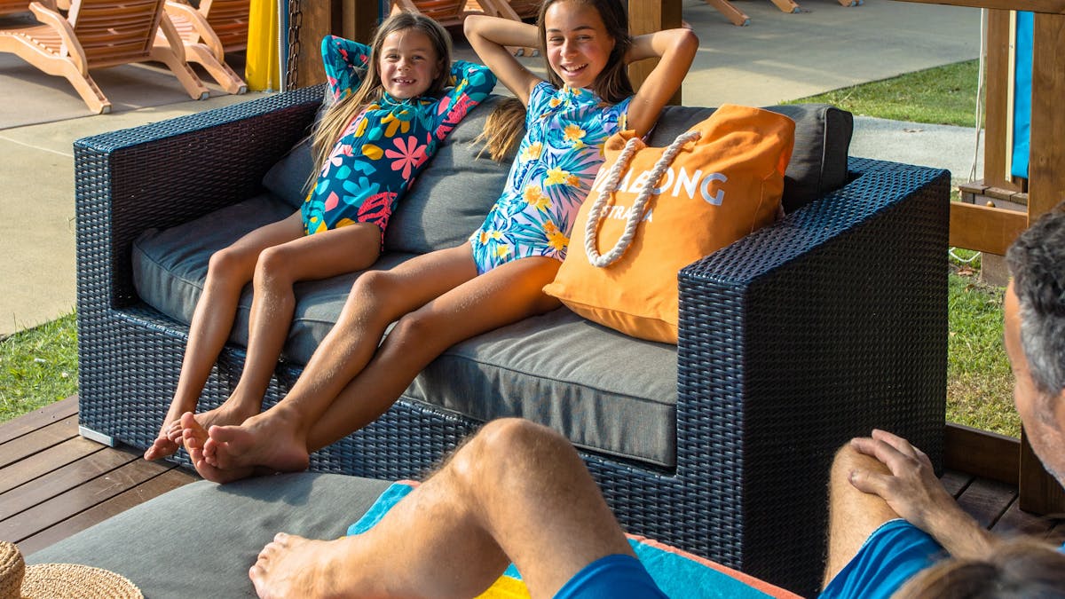 Family enjoying private Cabana at WhiteWater World