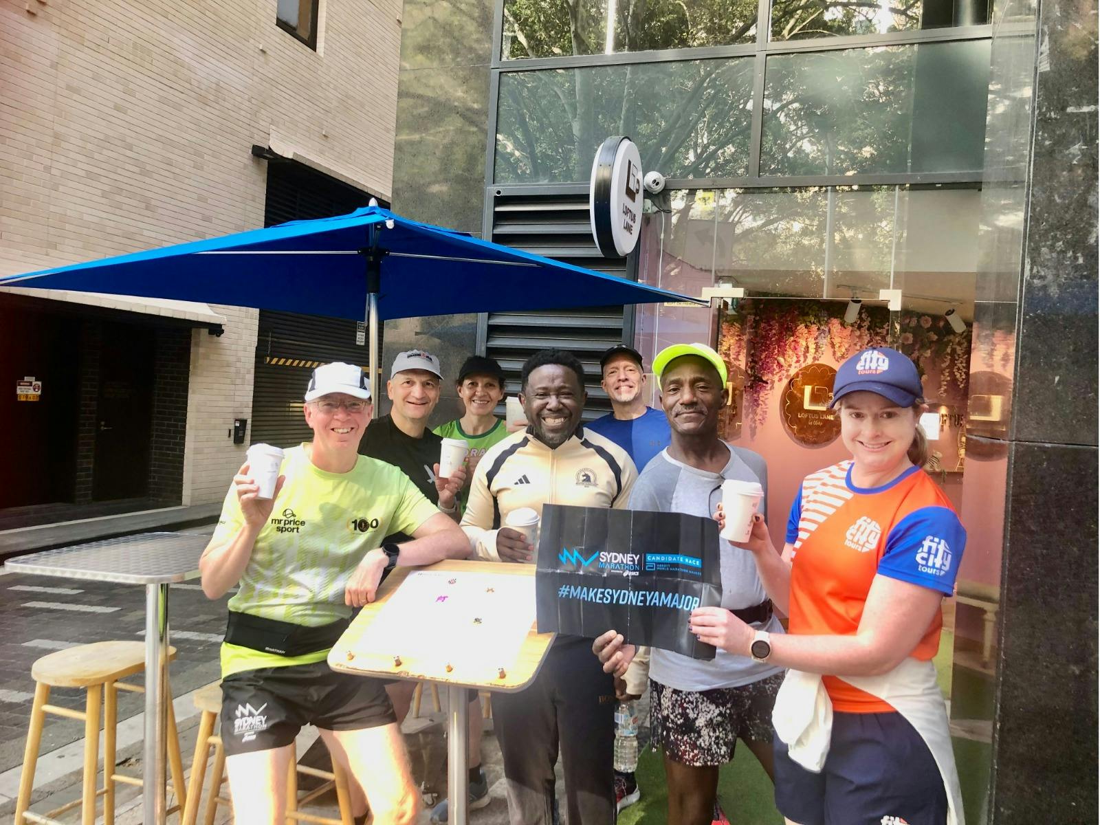 Group of runners enjoying coffee post-run